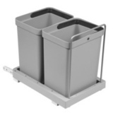 Waste basket caddy ovimekanismilla